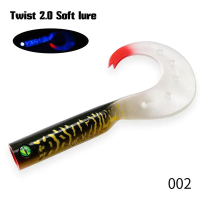Clear white soft fishing lure trailer with red fin and black glow stripe