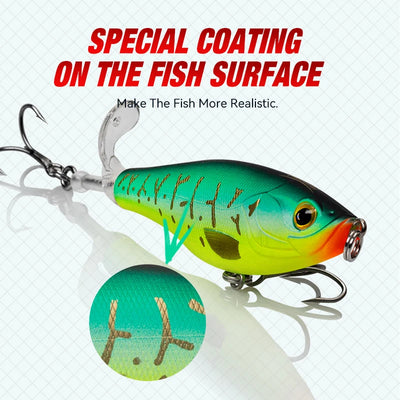 Green and orange hard-plopper topwater lure with treble hooks and rotating tail propeller