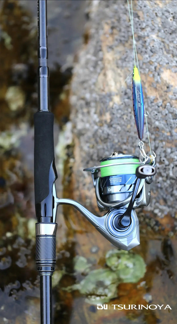 Silver spinning reel with green line spool attached to blue fishing rod
