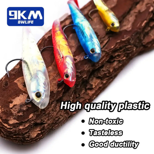Set of three soft swimbait lures with jig heads in white, red, and blue