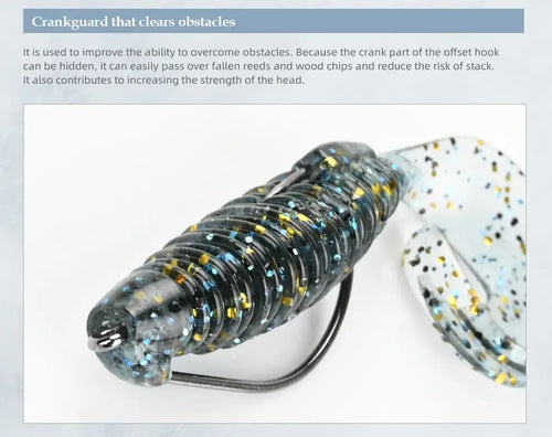 Soft silicone fishing lure with dark bluish body, gold glitter stripes, speckled tail