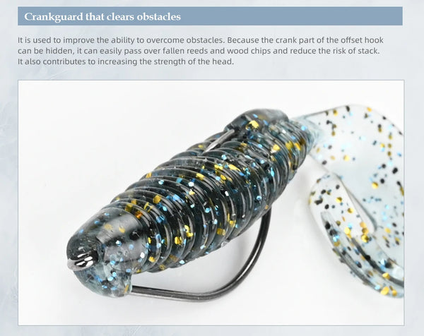 Soft silicone fishing lure with dark bluish body, gold glitter stripes, speckled tail