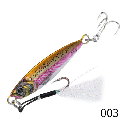 Metal jig fishing lure, gold and pink patterned body with split rings and treble hooks