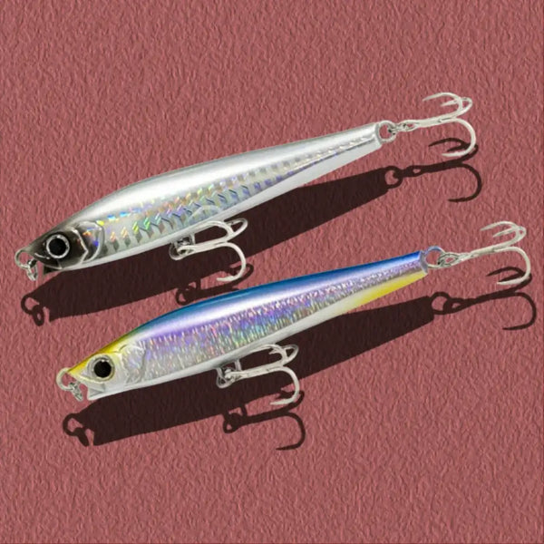 Iridescent silver lipless minnow sinking lure with rainbow scale pattern and treble hooks