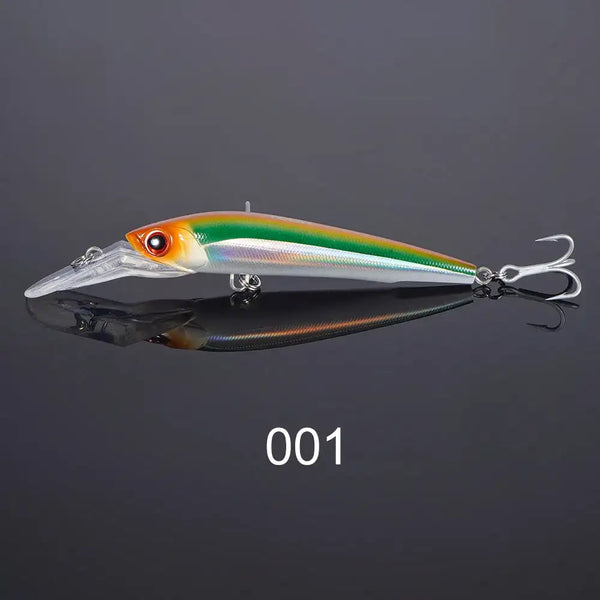 Green-white trolling minnow lure with orange eye and clear bill, double treble