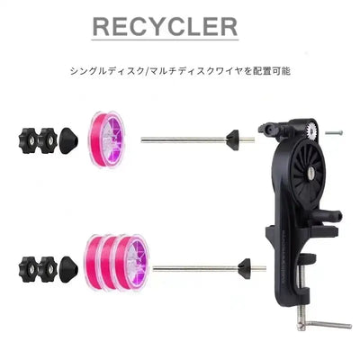 Fishing line winder table clamp holding a pink spool on an axle