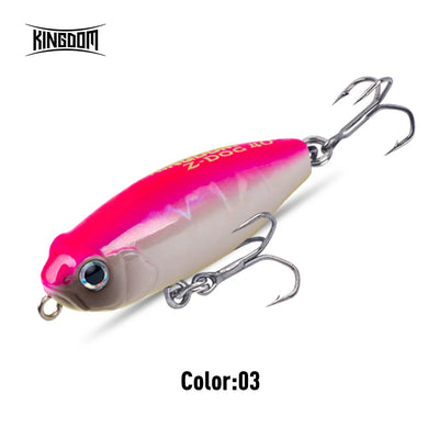Pink-and-white topwater stickbait pencil fishing lure with blue eye, two treble hooks