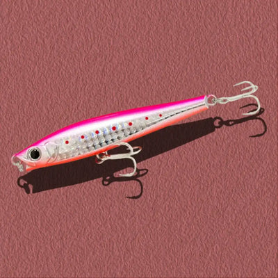 White lipless minnow sinking lure with pink-orange head and treble hooks