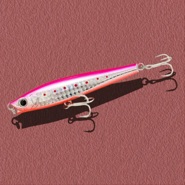 White lipless minnow sinking lure with pink-orange head and treble hooks