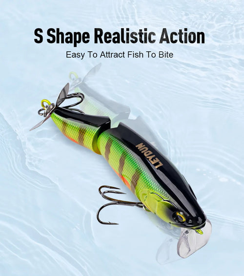 Green and yellow S-shaped action fishing lure with propeller tail, red stripe, and hooks