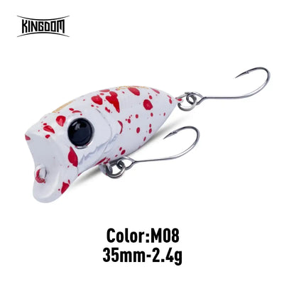 White and red speckled topwater popper fishing lure with two treble hooks