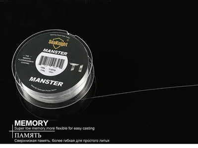Fluorocarbon-coated fishing line spool with MANSTER T1 label and clear monofilament line