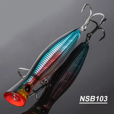 Hard fishing popper lure with blue metallic stripes, red lip, treble hooks (NSB103)
