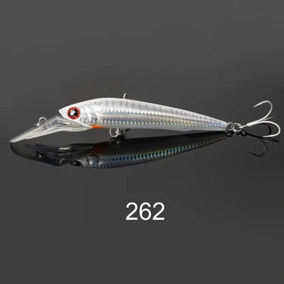 Silver-white trolling minnow lure with orange eye and blue belly, treble hooks