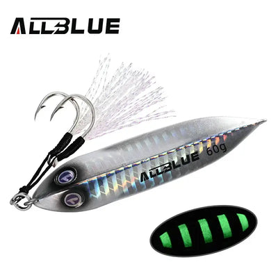 Metal jigging spoon in silver-gray with blue stripe pattern and black hooks