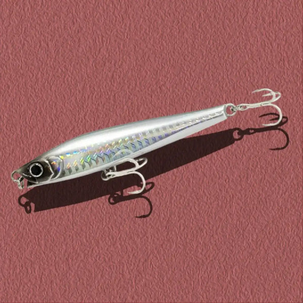 Silver iridescent lipless minnow sinking lure with rainbow side pattern and treble hooks