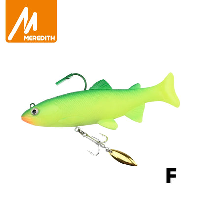 Soft plastic swimbait lure in bright green, gold spinner blade and treble hook