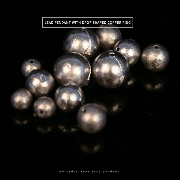 Dark gray lead ball pendant sinkers with drop-shaped metal ring and small hole