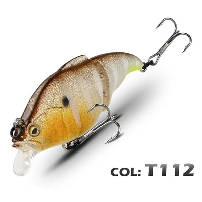 Gold and brown shimmer vibration fishing lure with clear lip, 3D-style eye, and two treble hooks