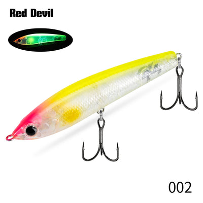 Topwater pencil fishing lure, chartreuse and pink with multiple treble hooks.