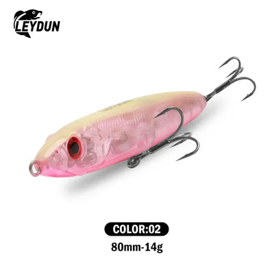Leydun Ministre Jack sinking pencil lure in translucent pink and yellow gradient with red eye and three treble hooks