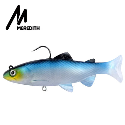 Weighted soft swimbait lure, blue with yellow belly, 3D eyes, T-tail, treble hook