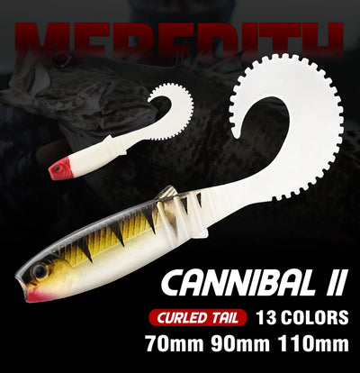 Curled-tail soft swimbait lure, white and yellow-black shad body with spiky fins.