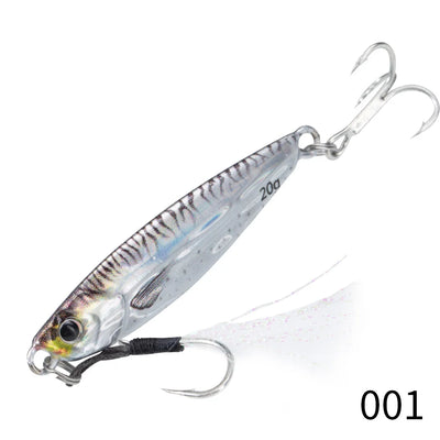 Metal jig fishing lure in silver with blue scale accents and two treble hooks.