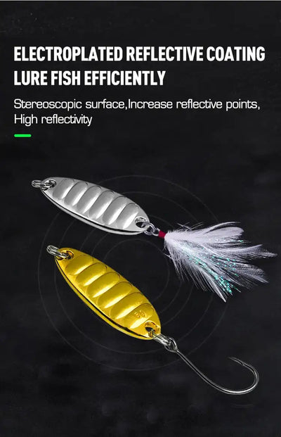 Gold and silver metal spoon lure with feather tail and treble hook