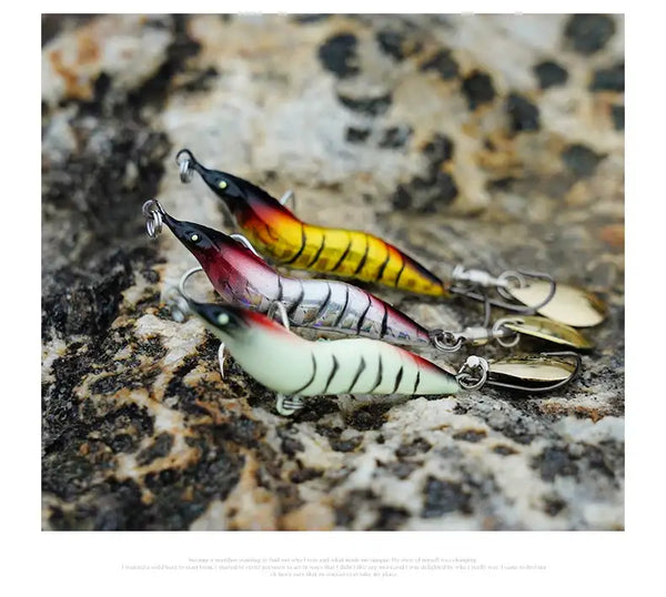 Artificial shrimp fishing lure spinner, multicolor bodies with silver hooks and spinner blades.
