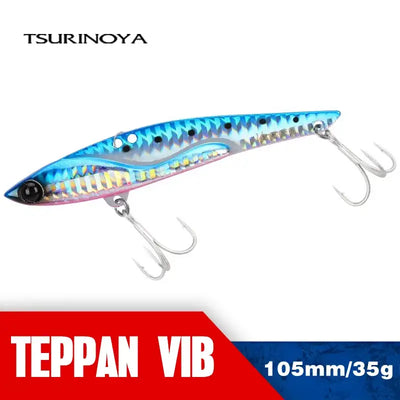 Metal vibration fishing lure, blue and silver patterned body with treble hooks