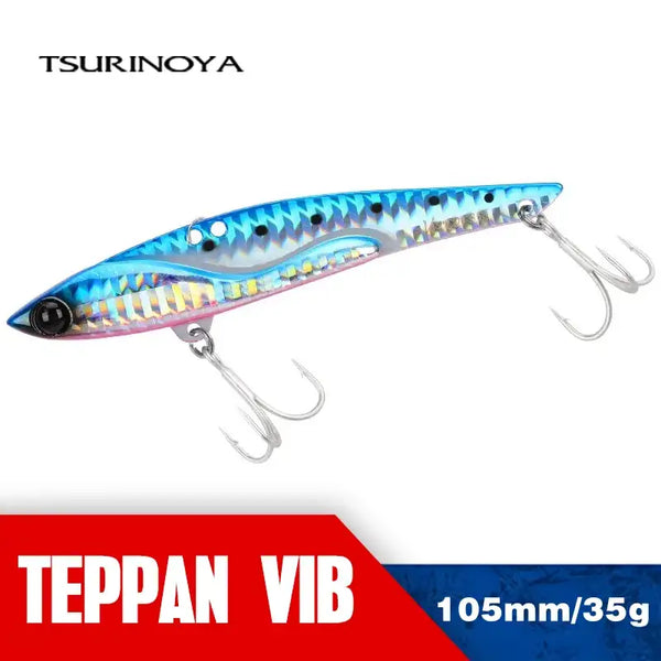 Metal vibration fishing lure, blue and silver patterned body with treble hooks