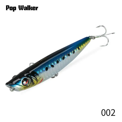 Dark blue and silver popper fishing lure with treble hooks, glossy hard bait