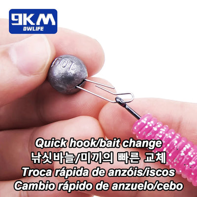 Close-up of a gray ball sinker hook clip with two wire prongs on a hook