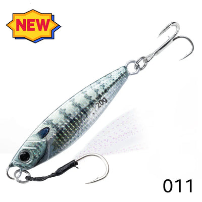 Metal jig fishing lure in light gray-blue speckle pattern with two treble hooks.