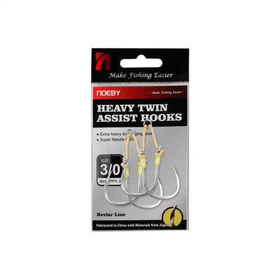 Heavy twin assist fishing hooks with yellow jig beads, size 3/0, on package