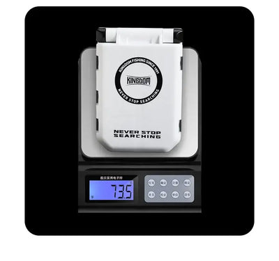 White small fishing tackle box placed on a digital scale, compact square shape