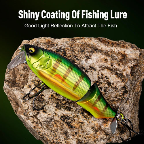 Green and yellow lure with red stripe, shiny finish, propeller tail, and two treble hooks