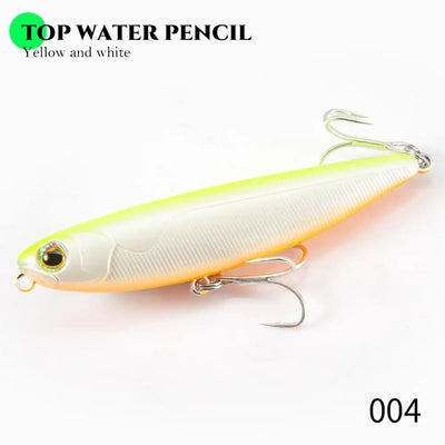 Floating pencil fishing lure in yellow and white with gold eye and treble hooks