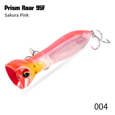 Floating topwater lure, pink translucent body with yellow eye and treble hooks