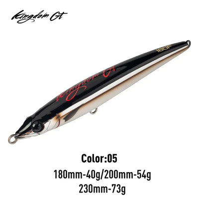 Floating pencil fishing lure, black back with pale sides and gold details, metal lip and hooks.