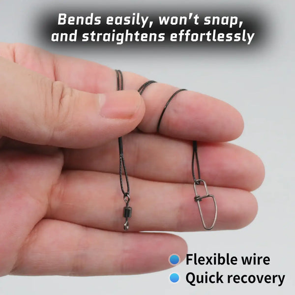 Flexible steel fishing wire leaders with loop ends and crosslock snap swivels, held in hand