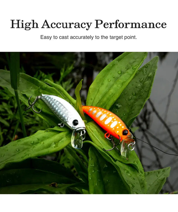 TSURINOYA Intruder 51S sinking minnow lure on leaves, orange-and-silver body, treble hooks