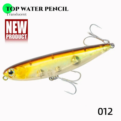 Floating pencil fishing lure in yellow-gold with translucent belly and treble hooks