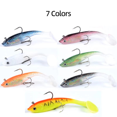 Seven soft fishing lure colors laid out, each with treble hook