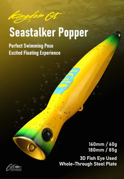 Yellow floating popper lure with green tail, black eye, gold front cup, rear treble