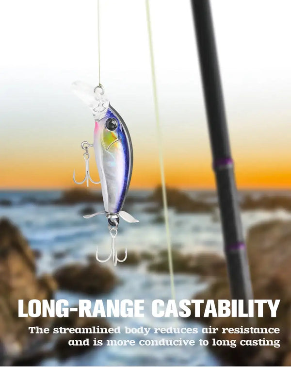 Sinking minnow fishing lure in silver with blue tint and double treble hooks.