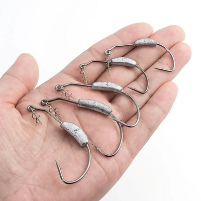 Weighted worm hook set with screw-in heads, shown on palm