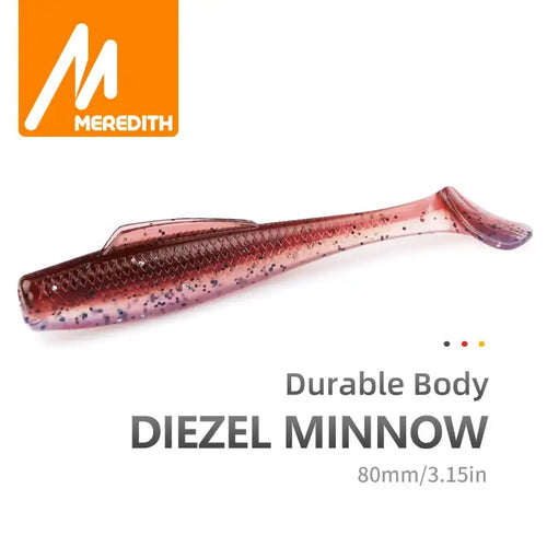 Brown and pink speckled soft plastic paddle tail minnow lure with translucent tail