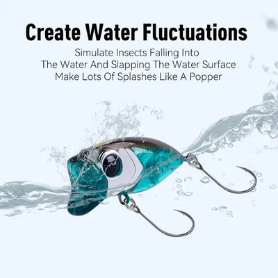 Floating popper lure with teal-and-white body and metal hooks, shown above water splash